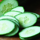 THIS IS A CUCUMBER, NOT A ZUCCHINI, THANKS. Image via Getty.